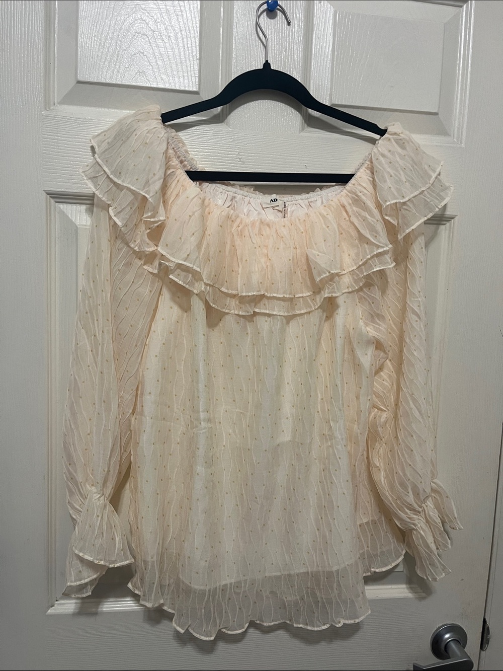 ADORA Cream Ruffled Off-Shoulder Blouse